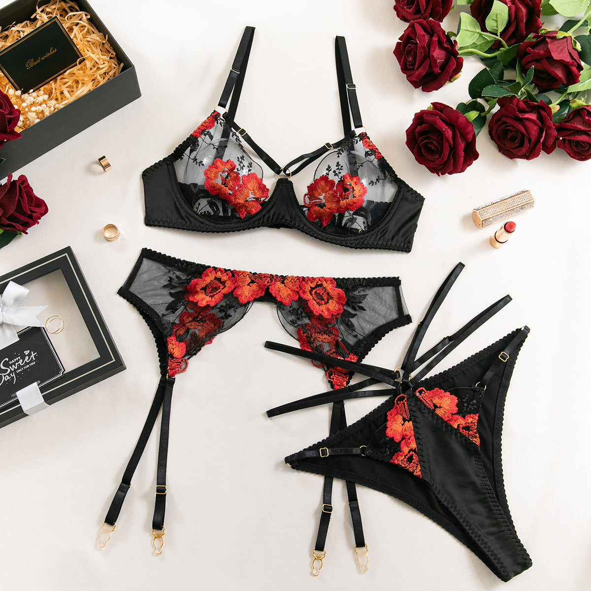 Verführerisches Schwarz mit floralen Stickereien & Strumpfhaltern